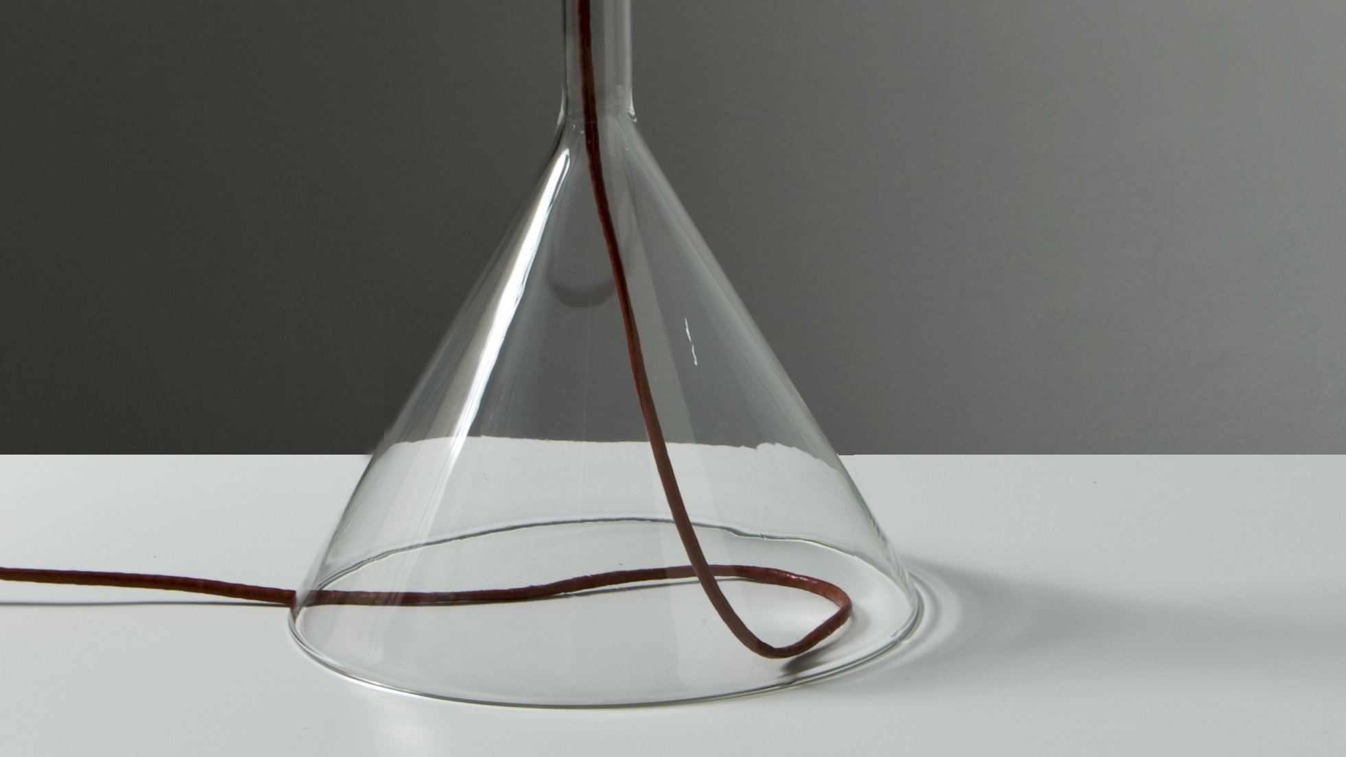 Detail of the Gost lamp switched on, with light passing through the glass