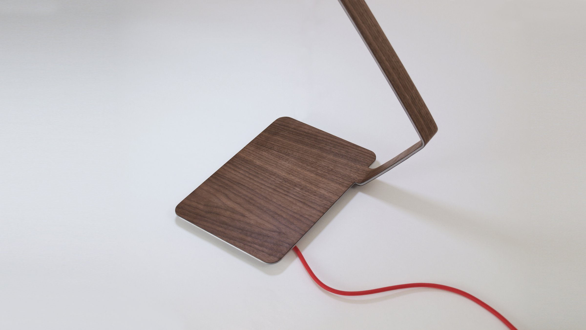 Detail of the folded walnut wood covering the OLED film of Lanx