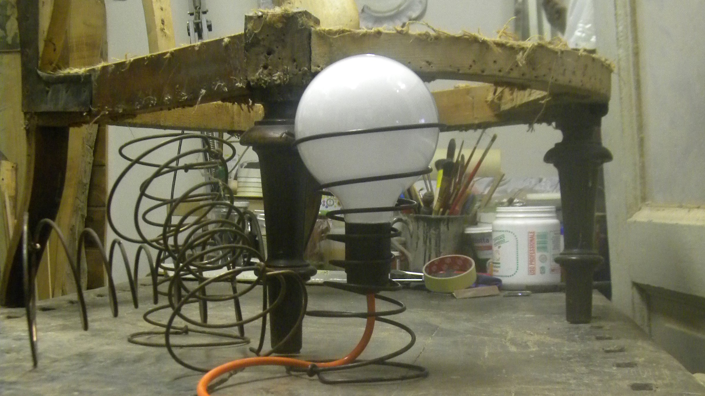Mollight switched on, on a bedside table