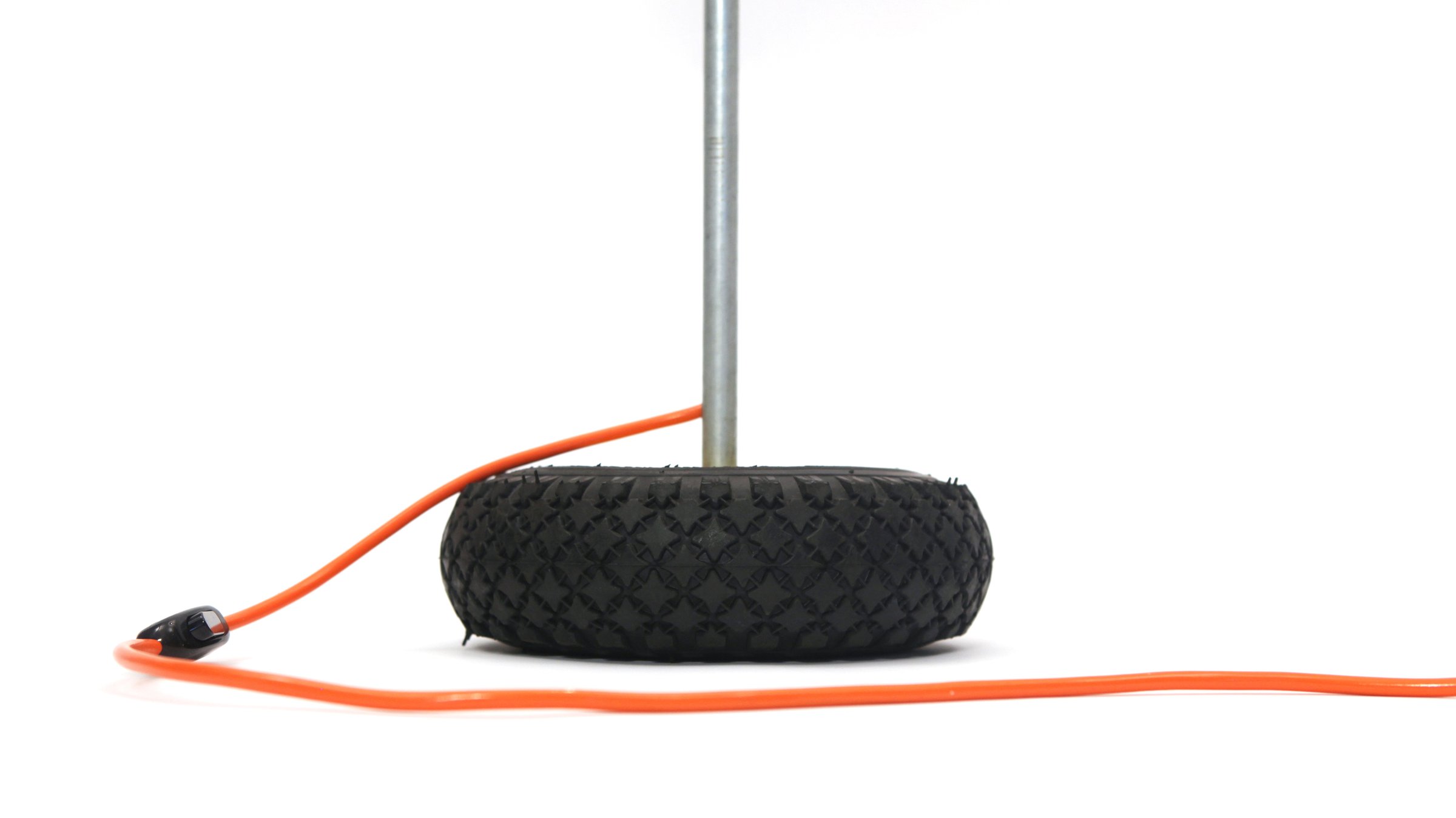 Detail of the base of the Tubularbells Ruota lamp made from a tyre